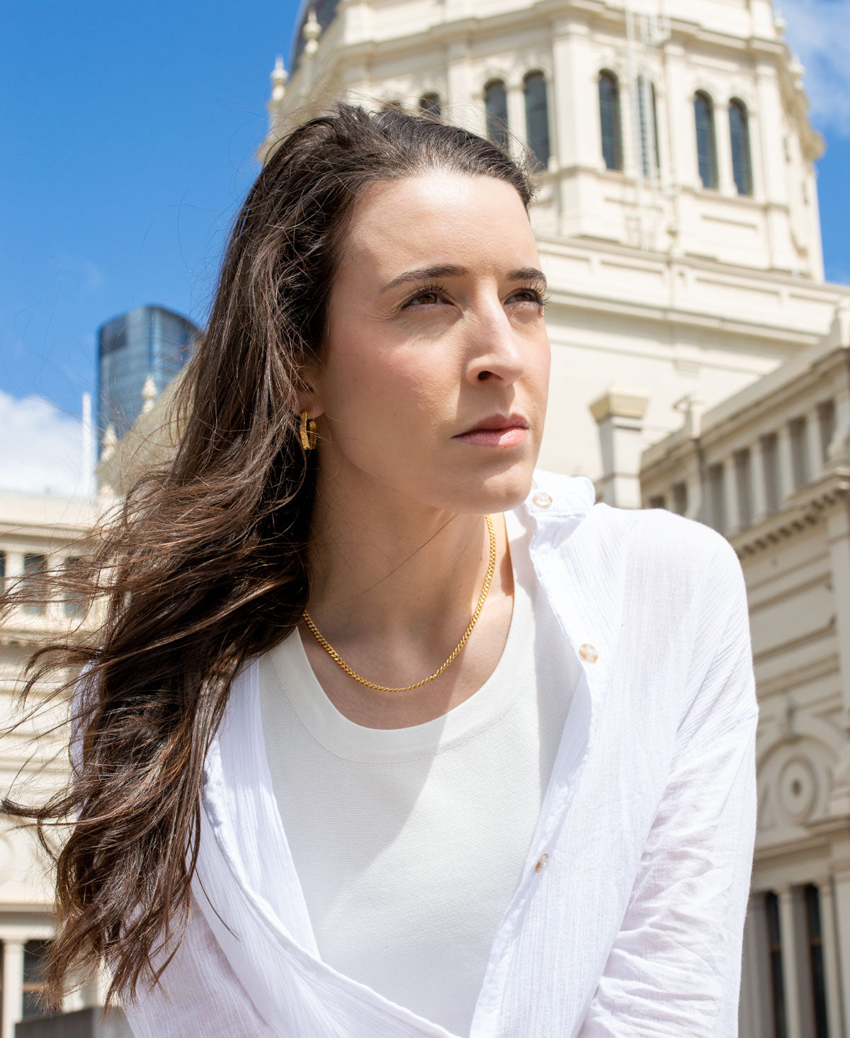 Cadena necklace lifestyle shot - bold Cuban link chain statement design