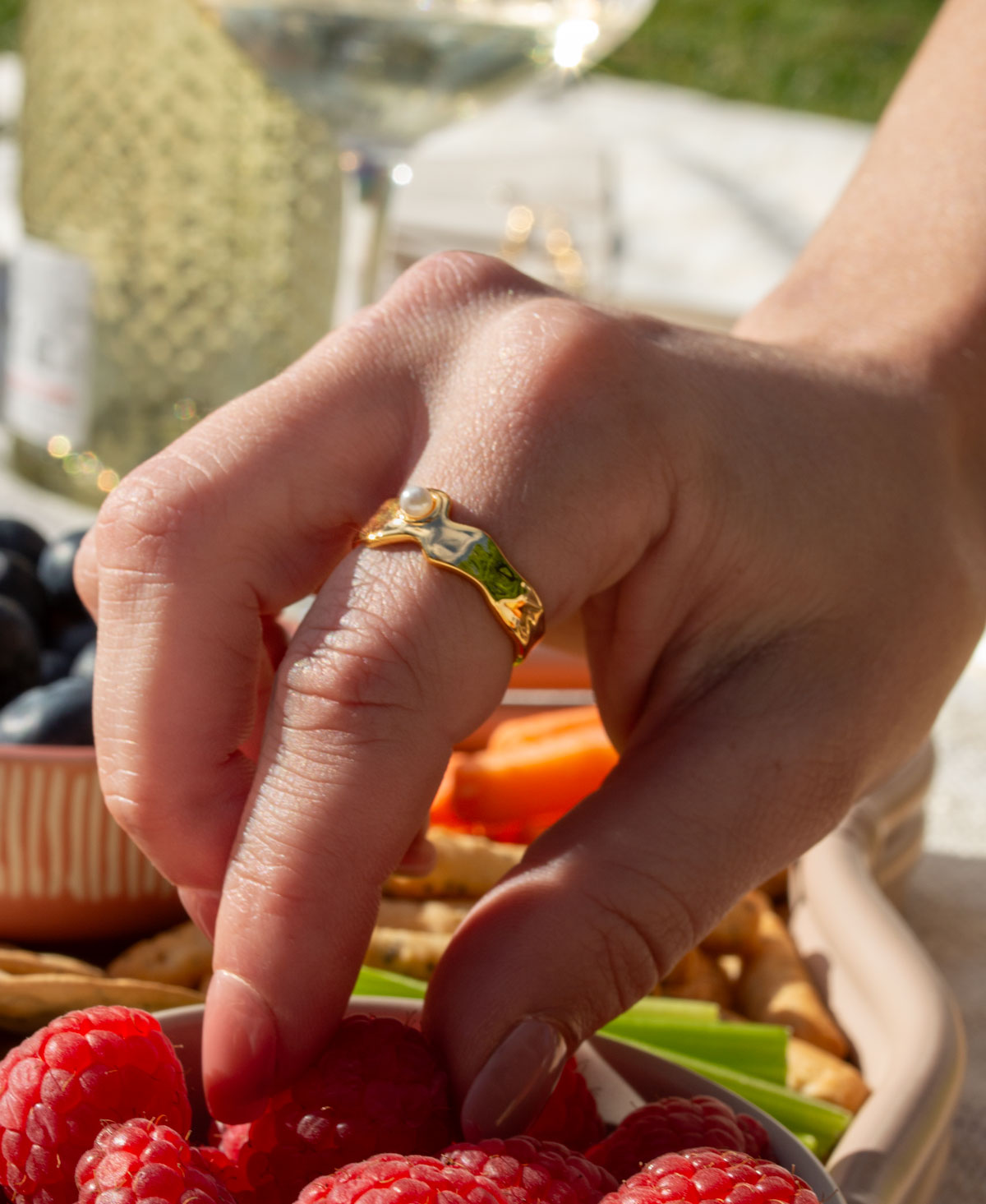 Del Mar ring worn on hand - organic wave band with natural pearl