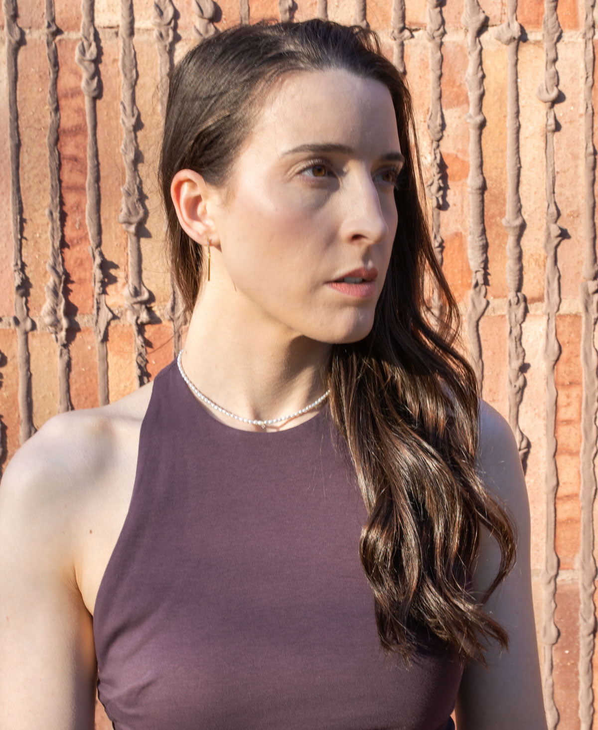 Margot necklace lifestyle shot - timeless pearl and zirconia design